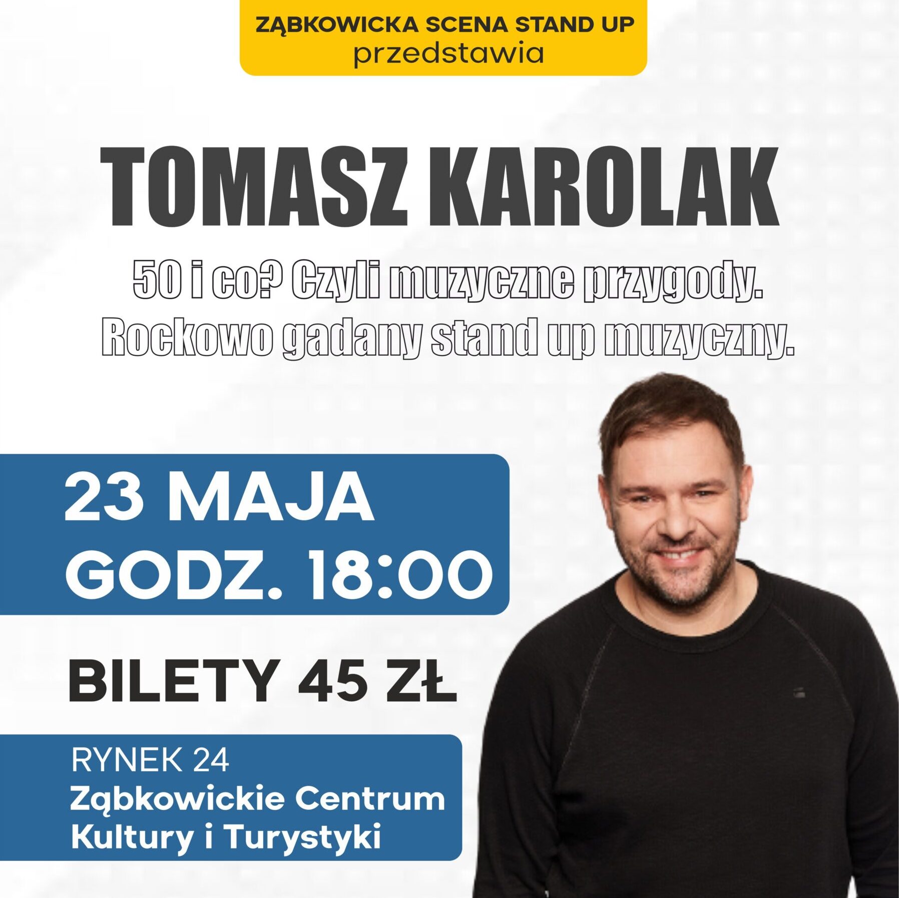 Plakat informujący o stand upie Tomasza Karolaka 23 maja o godzinie 18:00 w Ząbkowickim Centrum Kultury i Turystyki.